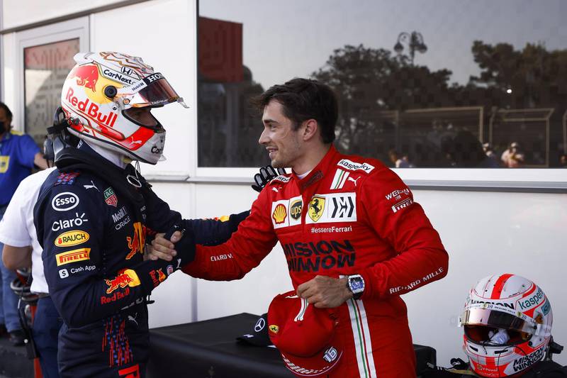 Ferrari driver Charles Leclerc, right, with Red Bull's Max Verstappen after the qualifying session for the Azerbaijan GP in Baku on Saturday. EPA