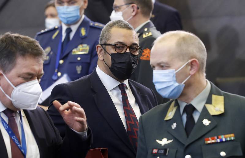 James Cleverly, centre, arriving for the Nato-Russia Council in Brussels on January 12. AP