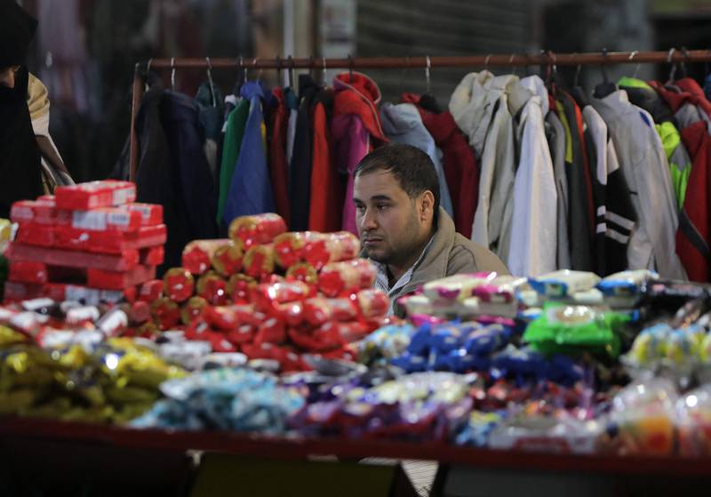A vendor in a market of Al Bab in Syria's northern Aleppo province on the border with Turkey. The dive of the Turkish lira, the main currency in the rebel-held parts of the war-torn northern Syria, now a de facto Turkish protectorate, has added to people's woes. AFP