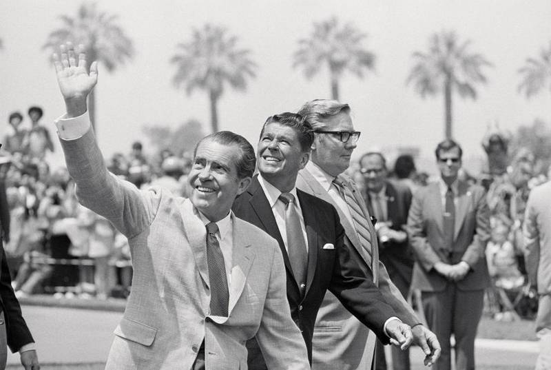 Richard Nixon, left, and Ronald Reagan, centre, in California in August 1971. Bettmann / CORBIS