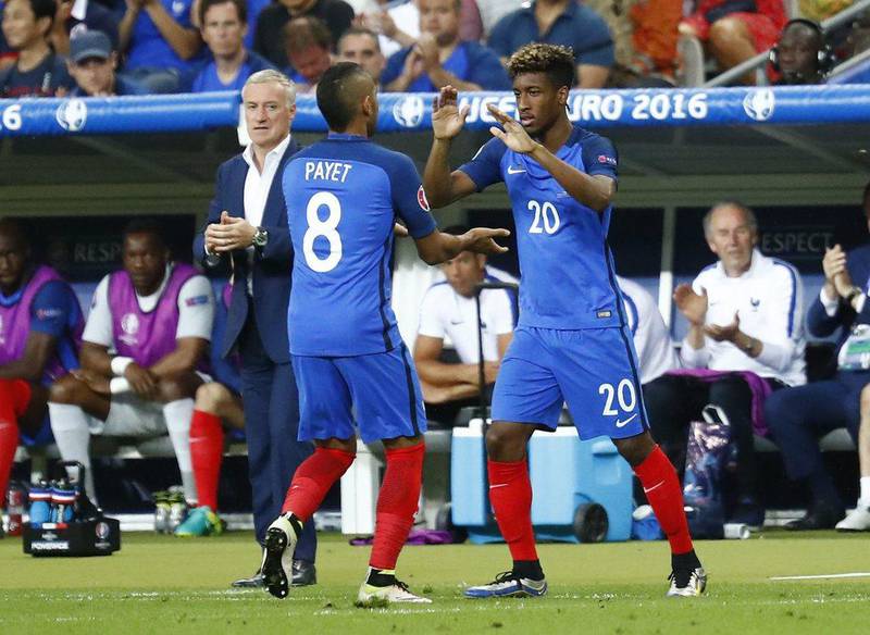 France’s Kingsley Coman is substituted on for Dimitri Payet as head coach Didier Deschamps looks on during the Uefa Euro 2016 Final at the Stade de France, 10 July 2016. Michael Dalder / Reuters