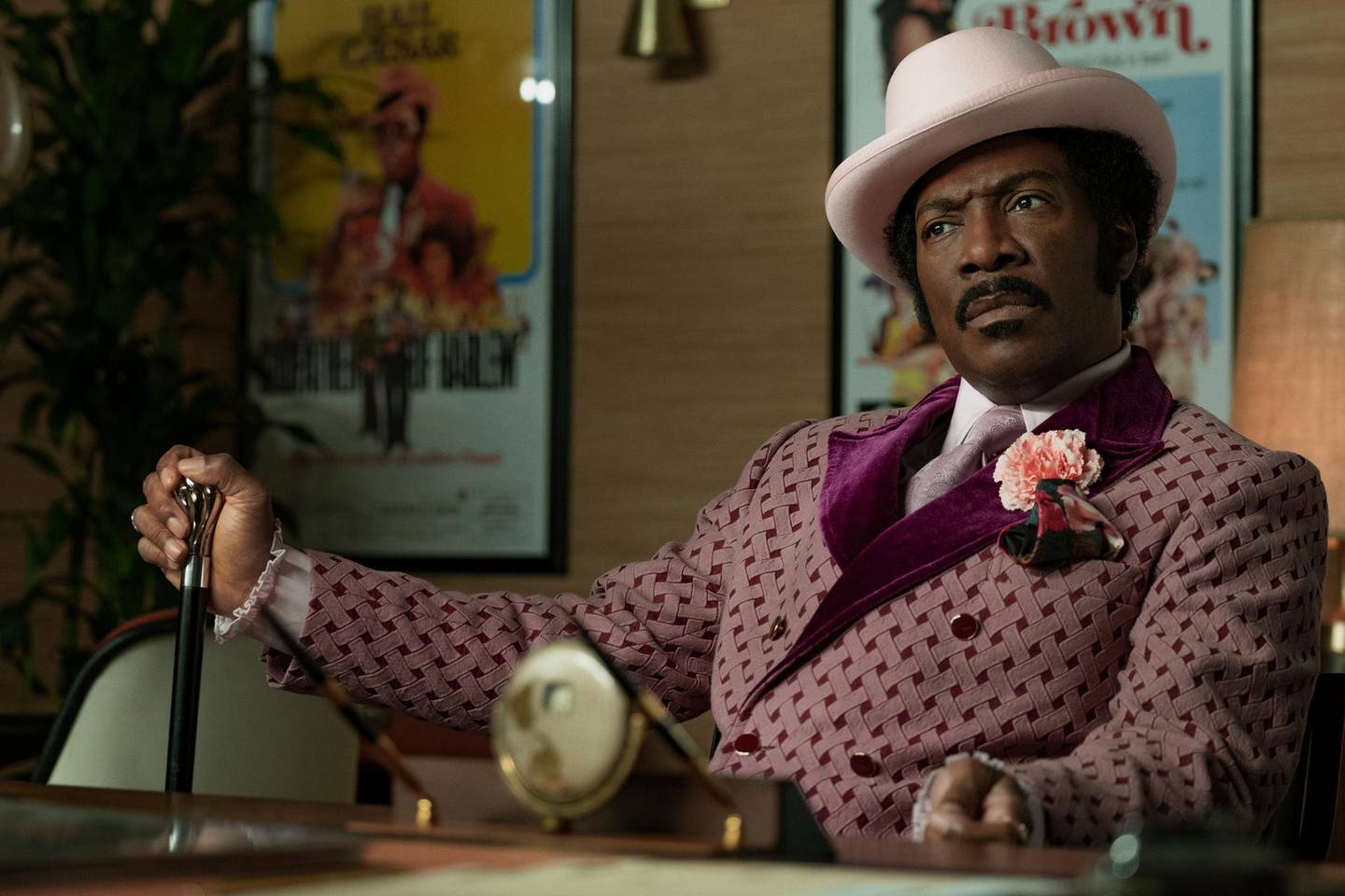 This image released by Netflix shows Eddie Murphy in a scene from "Dolemite Is My Name." (FranÃ§ois Duhamel/Netflix via AP)