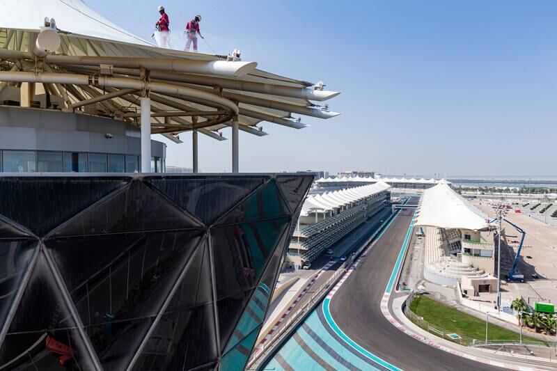 Cleaners give the Shams Tower canopy a scrub. Photo: Yas Marina Circuit