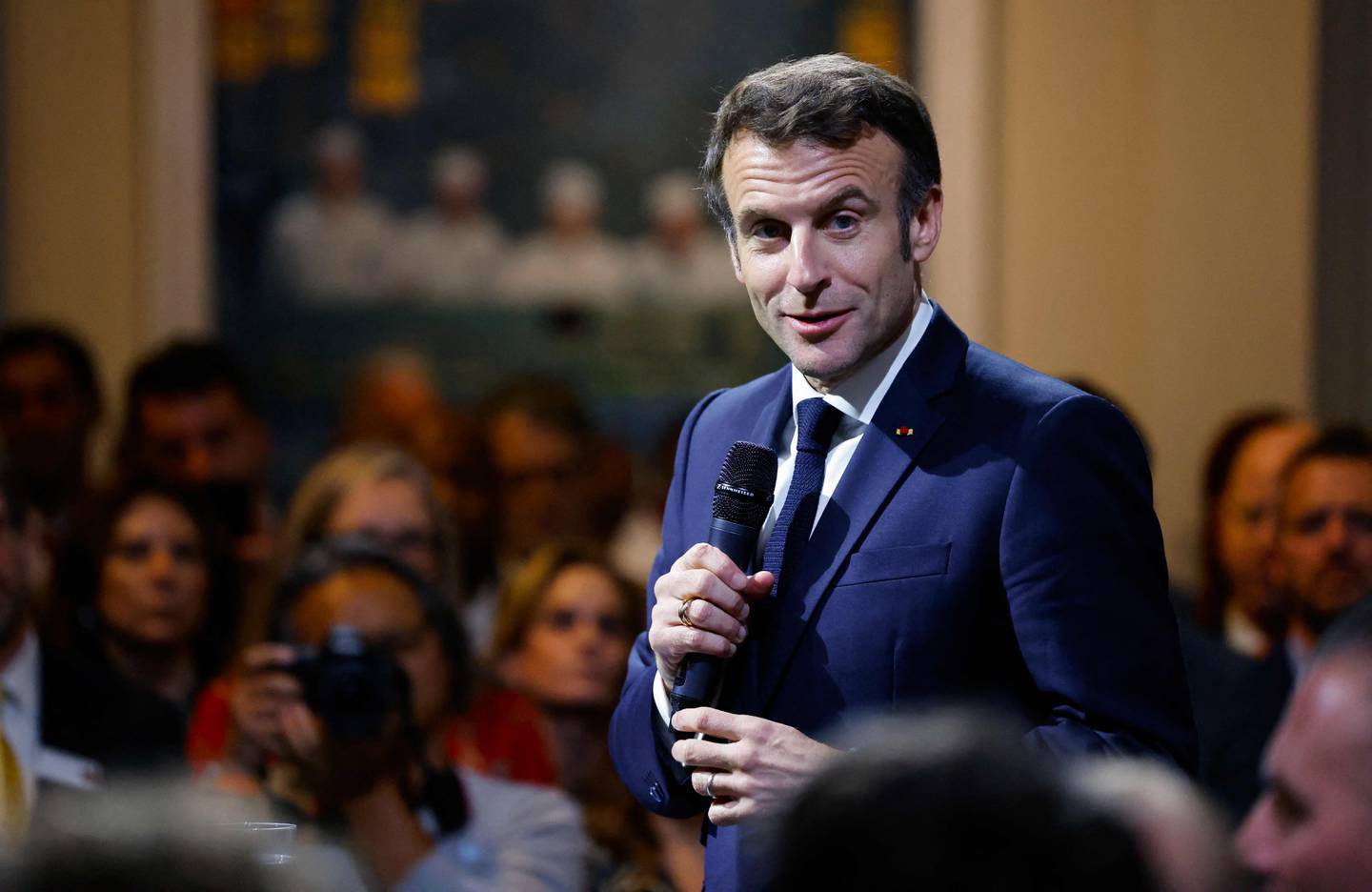 French President Emmanuel Macron promised to shake up pensions in his re-election campaign in April. AFP 