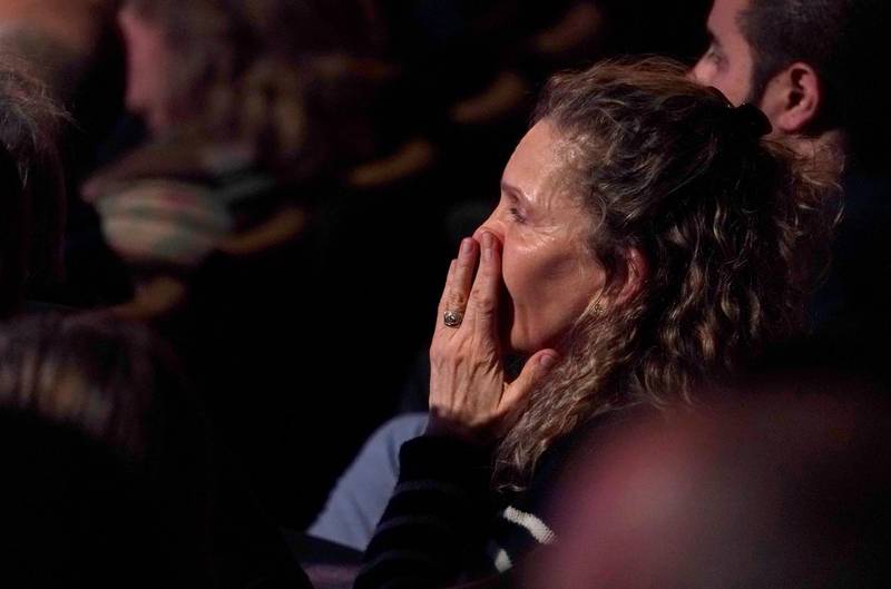 Members of the audience listen at the ninth Democratic 2020 U.S. Presidential candidates debate at the Paris Theater in Las Vegas, Nevada, U.S., February 19, 2020. REUTERS/Mike Blake