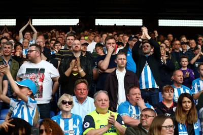 Huddersfield Town fans look dejected after the match. Reuters