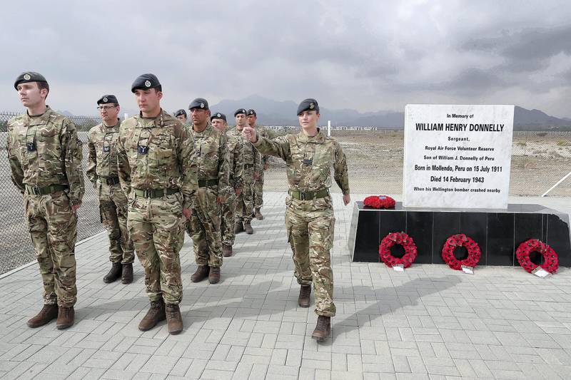 FUJAIRAH , UNITED ARAB EMIRATES , FEB 14  – 2018 :- Soldiers from UK Air Force during the memorial service of William Henry Donnelly , Sergeant , Royal Air Force who was died on 14 February 1943 after his Wellington Bomber crashed during the WW2 in Fujairah. ( Pawan Singh / The National ) For News. Story by John