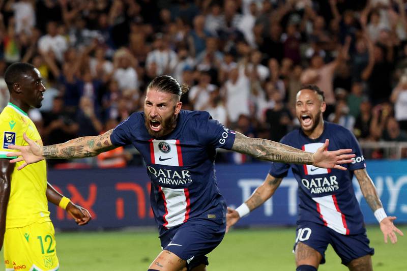 Sergio Ramos celebrates with Neymar after scoring PSG's third goal in the Trophee des Champions. AFP
