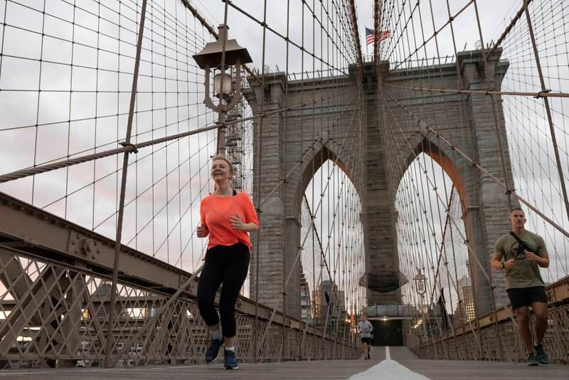 Liz Truss on a morning jog over Brooklyn Bridge in New York in September 2021. Simon Dawson / No10 Downing Street