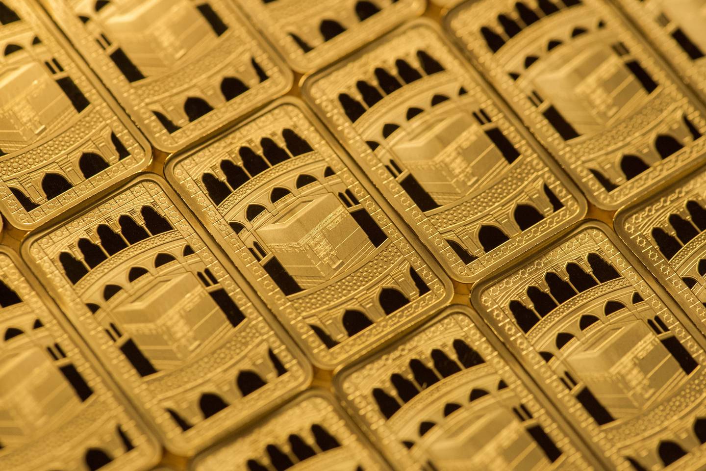 Gold bullion bars depicting the the Kaaba in Makkah, released by the Royal Mint. PA 