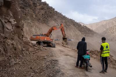 A digger clears a mountain road in Talat N'Yaaqoub. Getty Images