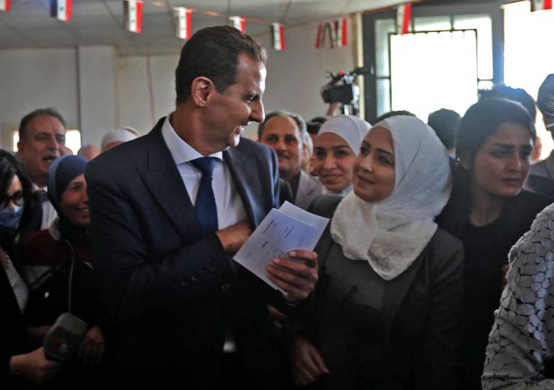 President Al Assad is surrounded by well-wishers. The US, European powers and the UN described the election as "illegitimate", amid accusations of rigging. AFP