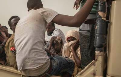 Ethiopian migrants are taken to a lock-up known in Arabic as a 'hosh' by smugglers in Ras Al Ara, Lahj, south-western Yemen in July 2019. Nearly every migrant who lands is imprisoned while their families are shaken down for money. Women are subjected to daily torments ranging from beatings and rapes to starvation. Of every thousand, 800 men and women disappear in the lockups, said one humanitarian worker