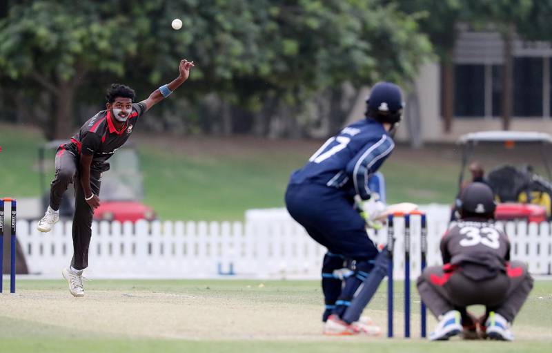 DUBAI, UNITED ARAB EMIRATES , Dec 15– 2019 :- Palaniapan Meiyappan of UAE bowling during the World Cup League 2 cricket match between UAE vs Scotland held at ICC academy in Dubai. He took 2 wickets in this match. ( Pawan Singh / The National )  For Sports. Story by Paul