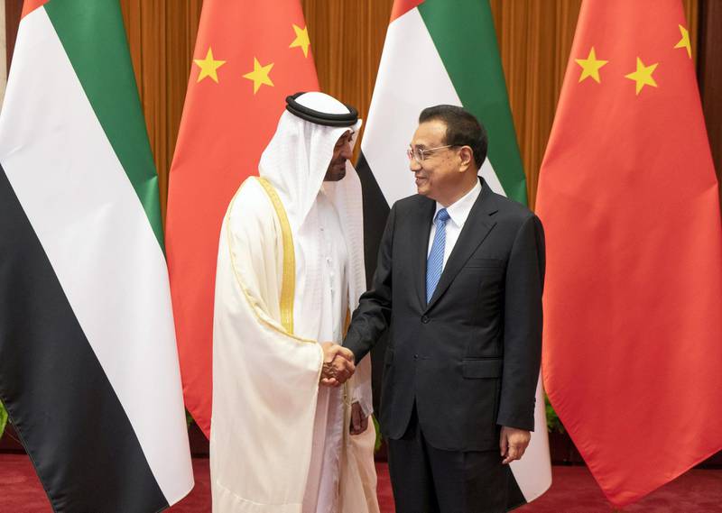 BEIJING, CHINA - July 22, 2018: HH Sheikh Mohamed bin Zayed Al Nahyan, Crown Prince of Abu Dhabi and Deputy Supreme Commander of the UAE Armed Forces (L) stands for a photograph with HE Li Keqiang, Premier of the State Council of China (R), at the Great Hall of the People.

( Rashed Al Mansoori / Ministry of Presidential Affairs )
---