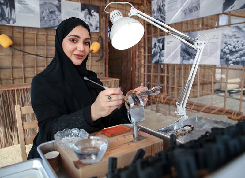 Ayesha Al Hammadi at the pearl farm tent organised by the Environment Agency - Abu Dhabi. Victor Besa / The National