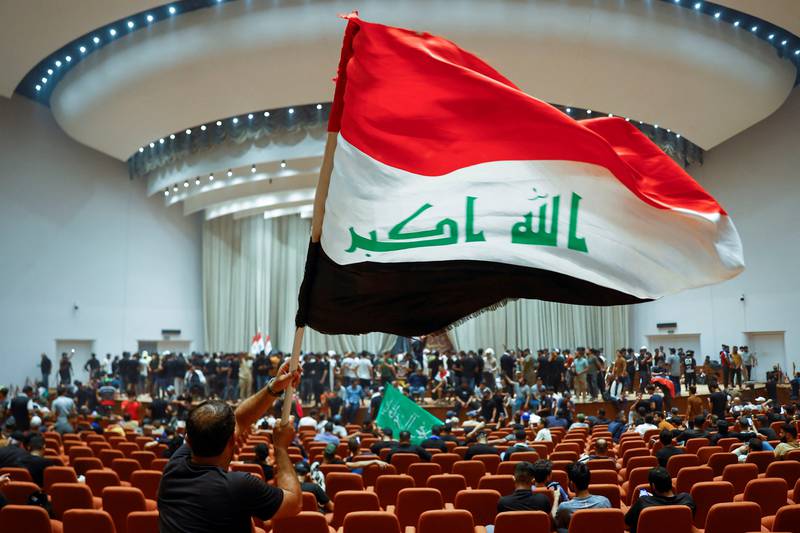 Supporters of Iraqi Shiite cleric Moqtada Al Sadr protest inside the parliament building, in Baghdad. Reuters