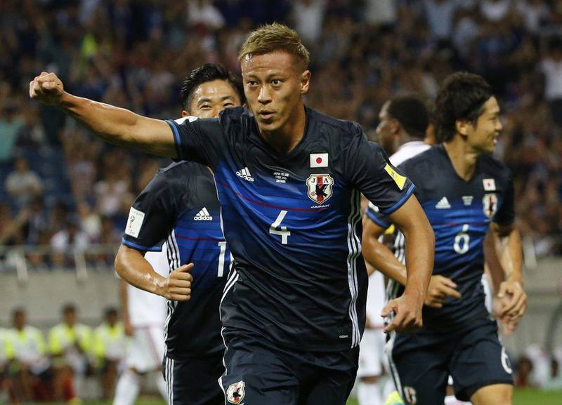 Keisuke Honda celebrates scoring the opening goal. Shuji Kajiyama / AP Photo