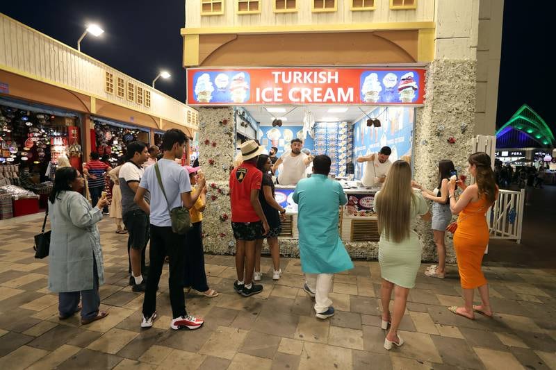 Queue builds up in front of a Turkish ice cream outlet. 