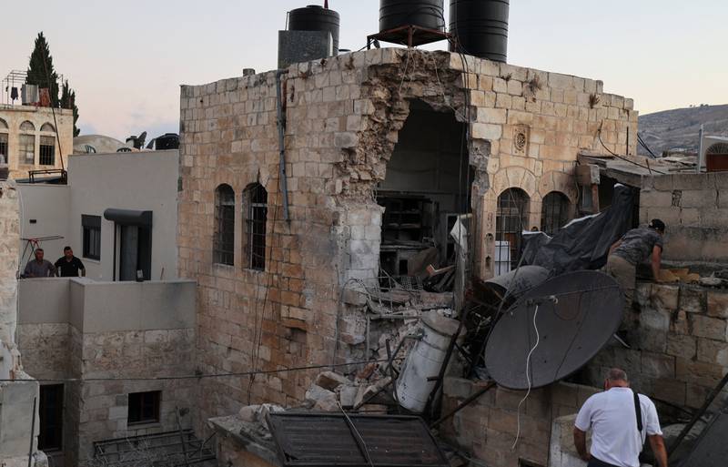 The house where the militants were hiding was hit by Israeli gunfire. AFP