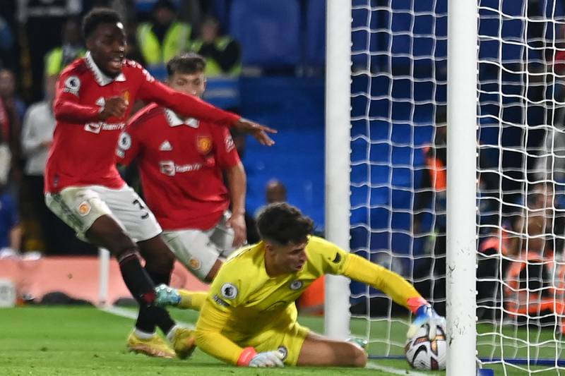 Chelsea's goalkeeper Kepa Arrizabalaga  fails to stop the ball from crossing the line from a header by Manchester United's Casemiro. AFP