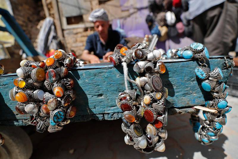 A street vendor displays gemstone rings at a market in Tahrir Square, in the Iraqi capital Baghdad. AFP