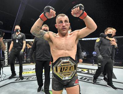 ABU DHABI, UNITED ARAB EMIRATES - JULY 12: Alexander Volkanovski of Australia celebrates after his split-decision victory over Max Holloway in their UFC featherweight championship fight during the UFC 251 event at Flash Forum on UFC Fight Island on July 12, 2020 on Yas Island, Abu Dhabi, United Arab Emirates. (Photo by Jeff Bottari/Zuffa LLC)