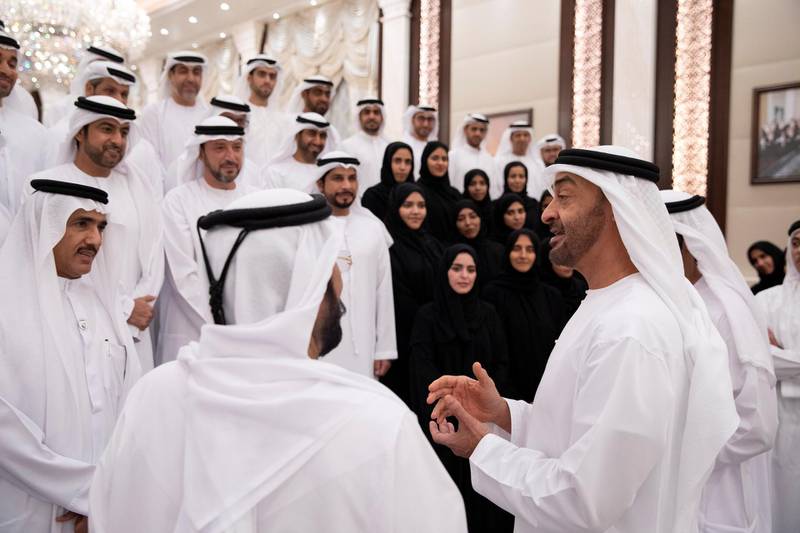 ABU DHABI, UNITED ARAB EMIRATES - May 28, 2019: HH Sheikh Mohamed bin Zayed Al Nahyan, Crown Prince of Abu Dhabi and Deputy Supreme Commander of the UAE Armed Forces (R), receives members of Ministry of Presidential Affairs, during an iftar reception at Al Bateen Palace. Seen with HE Ahmed Juma Al Zaabi, UAE Deputy Minister of Presidential Affairs (L).

( Hamad Al Mansouri for the Ministry of Presidential Affairs )
---