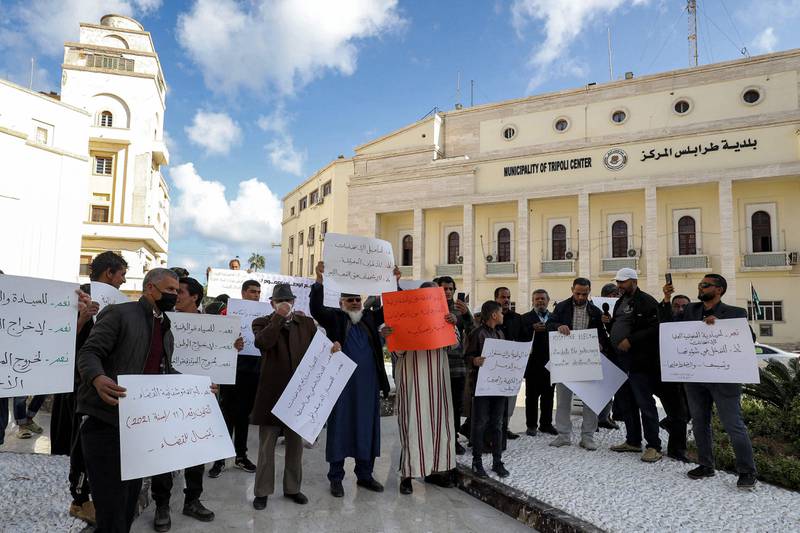 Local NGO activists gather for a demonstration at Algeria Square in the Libyan capital on December 15 to protest against any possible postponement of the elections scheduled for December 24. AFP