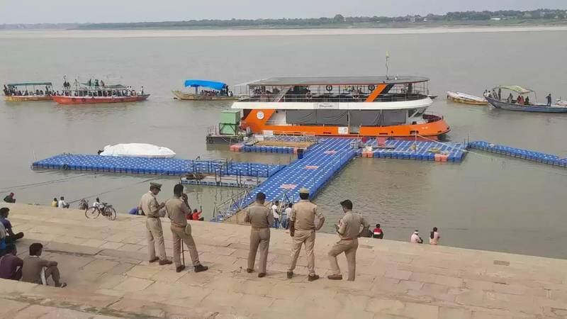 Police on patrol as boatmen surround a water taxi in protest. Tarushi Aswani for The National