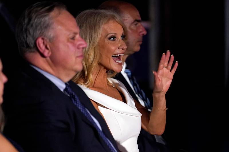 White House counselor Kellyanne Conway waves as she waits to hear Vice President Mike Pence speak. AP Photo