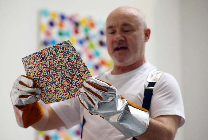 In July 2021, a collection of 10,000 NFTs by Damien Hirst were launched with corresponding physical artworks. Reuters