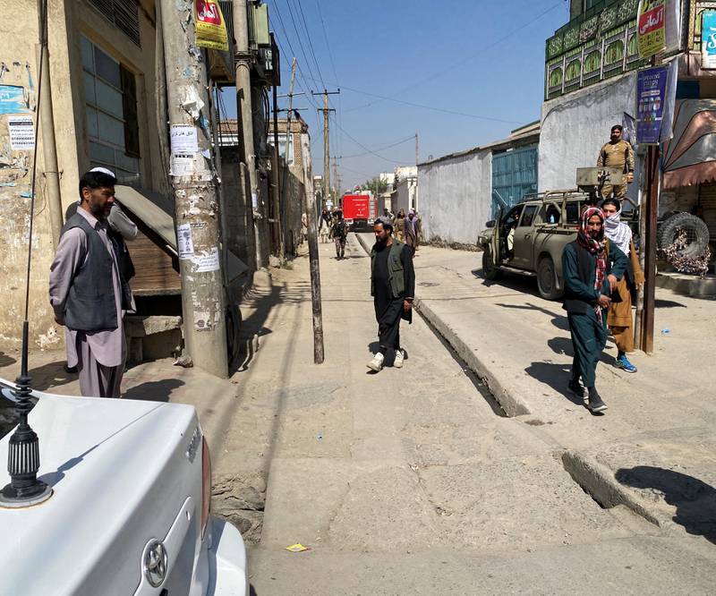 Afghans on the streets outside Mohammad Ali Jinah Hospital following the suicide attack. Reuters