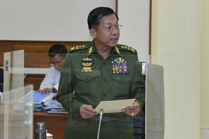 Min Aung Hlaing talks during the National Defence and Security Council meeting in Naypyitaw, Myanmar, last month. AP Photo
