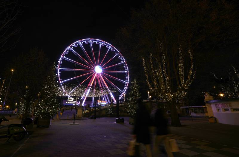 A Ferris wheel in the historic centre of Antwerp, Belgium. The government will meet to decide whether new Covid-19 measures will be taken. AP
