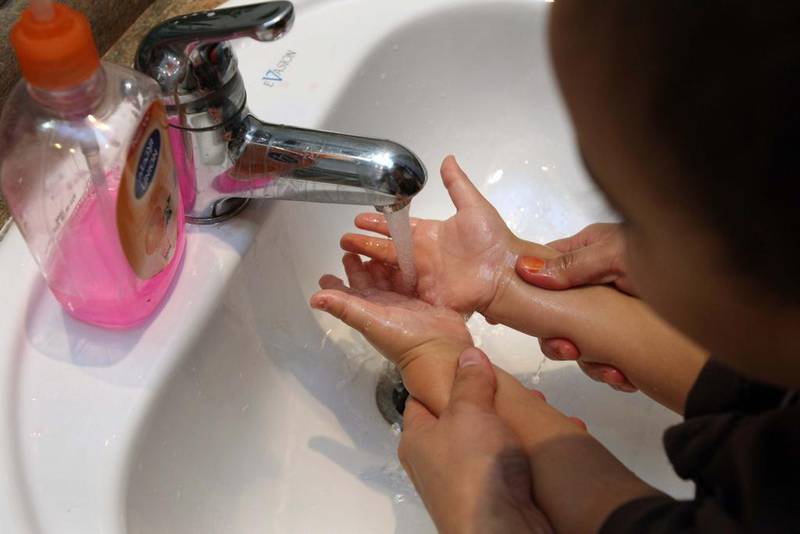 Good health starts with good basic hygiene, the experts say. And key to slowing the spread of infectious diseases is that children, and adults, are taught to wash their hands regularly. Stephen Lock / The National