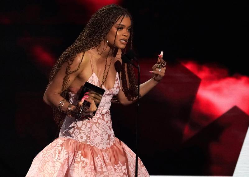 Andra Day accepts the best actress award at the BET Awards on Sunday, June 27, 2021, at the Microsoft Theater in Los Angeles. (AP Photo/Chris Pizzello)