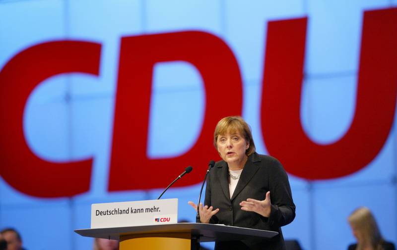 Mrs Merkel speaks at the CDU party congress in December 2003, in Leipzig. Getty Images