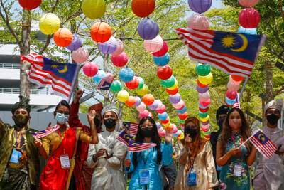 Volunteers take part in events to mark Malaysia Day. More than 76 per cent of Malaysia's adult population have been fully vaccinated against Covid-19. EPA