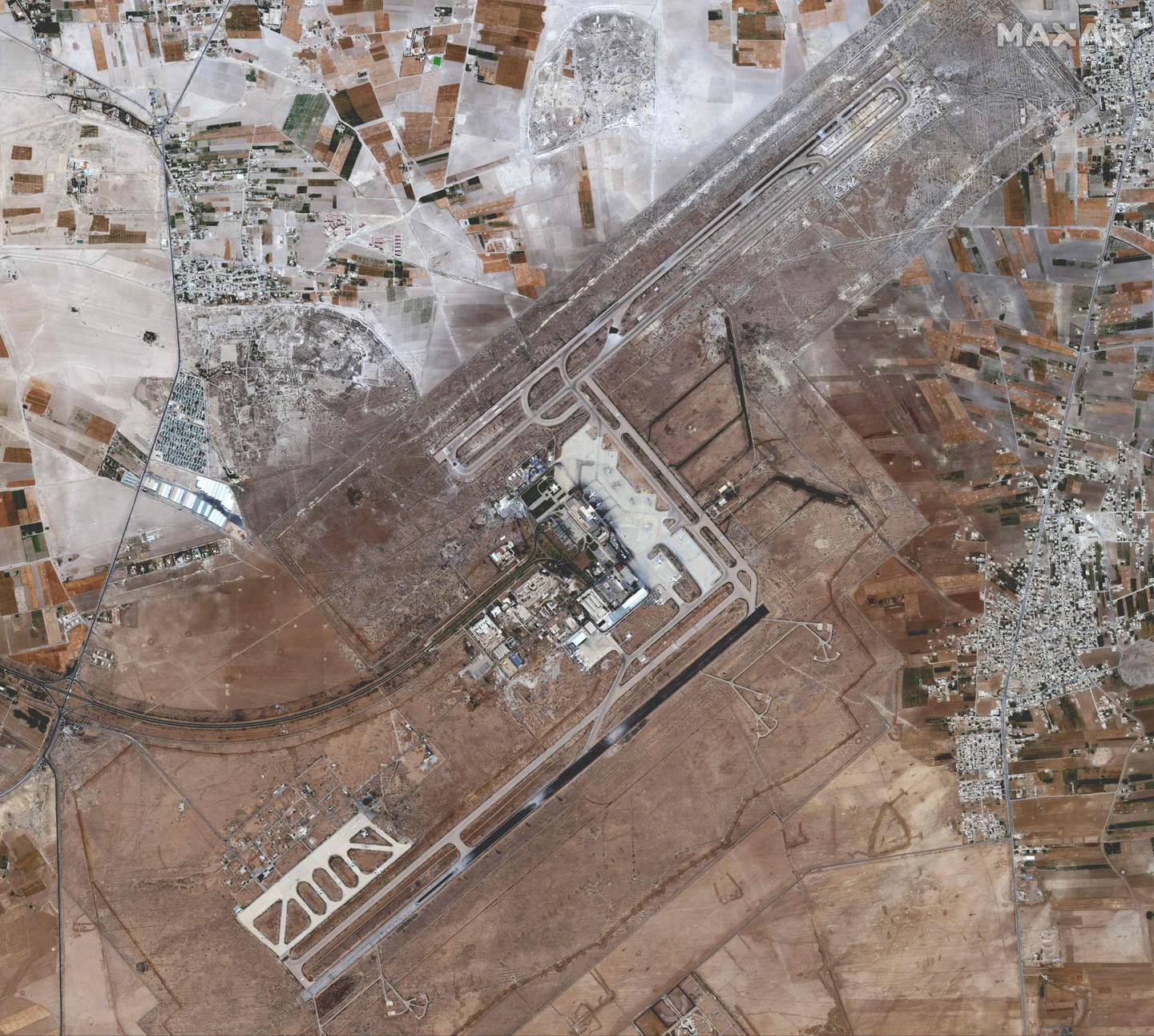 This aerial picture shows damaged runways at Damascus International Airport in June 2022. AFP
