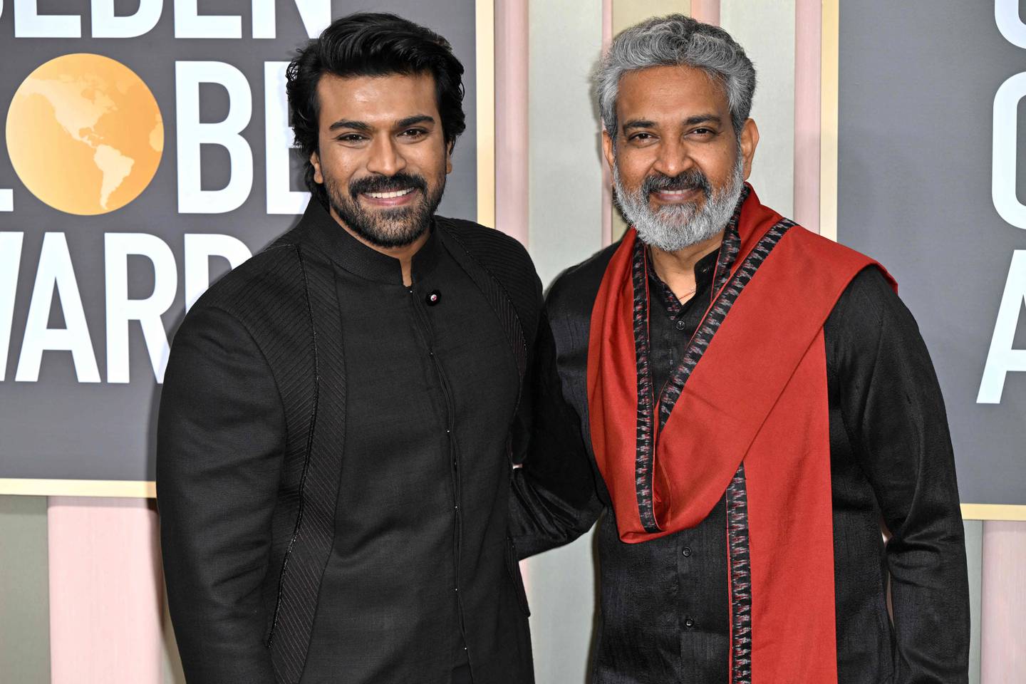 Indian actor Ram Charan and director S S Rajamouli arrive for the 80th annual Golden Globe Awards. AFP