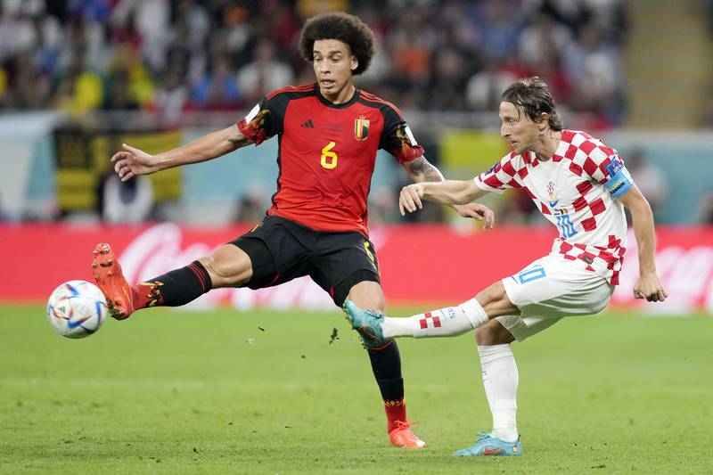 Croatia's Luka Modric, right, and Belgium's Axel Witsel, left. AP Photo