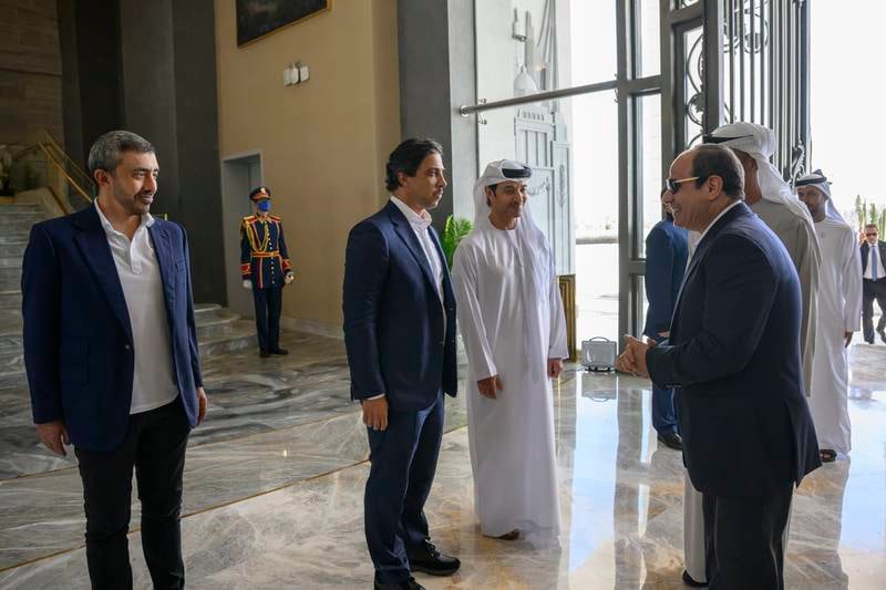 Sheikh Abdullah, Sheikh Mansour and Sheikh Hazza greet Mr El Sisi before a meeting. Hamad Al Kaabi / UAE Presidential Court


