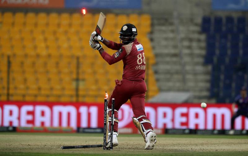 ABU DHABI , UNITED ARAB EMIRATES , Nov 20 – 2019 :- Darren Sammy  of Northern Warriors bowled out by David Wiese of Bangla Tigers during the Abu Dhabi T10 Cricket match between Bangla Tigers vs Northern Warriors at Sheikh Zayed Cricket Stadium in Abu Dhabi. ( Pawan Singh / The National )  For Sports. Story by Paul