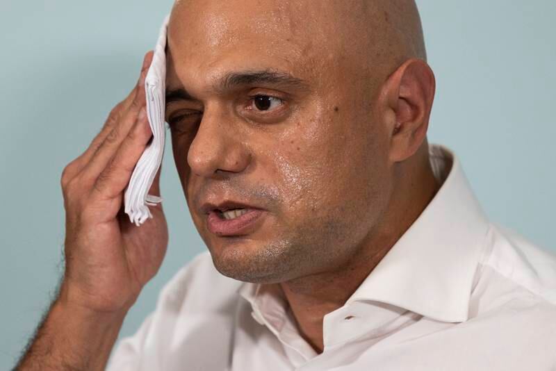 Sajid Javid mops his brow while launching his campaign. Getty