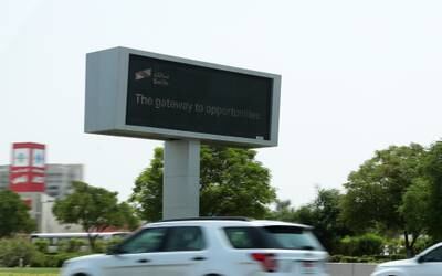 Electronic traffic signs on E311 highway, which is being used to advertise the new Salik IPO scheme in Dubai. Pawan Singh / The National