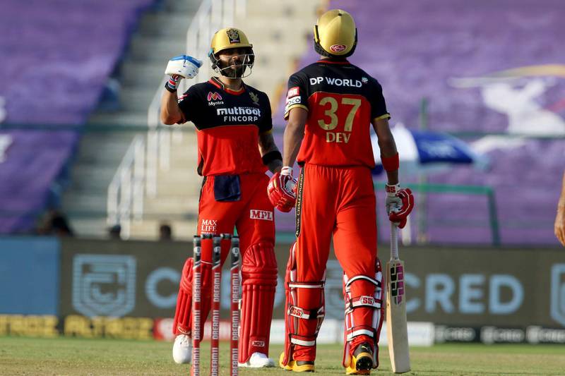 Virat Kohli captain of Royal Challengers Bangalore congratulates  Devdutt Padikkal of Royal Challengers Bangalore for scoring a fifty during match 15 of season 13 of the Dream 11 Indian Premier League (IPL) between the Royal Challengers Bangalore and the Rajasthan Royals at the Sheikh Zayed Stadium, Abu Dhabi in the United Arab Emirates on the 3rd October 2020.  Photo by: Vipin Pawar  / Sportzpics for BCCI