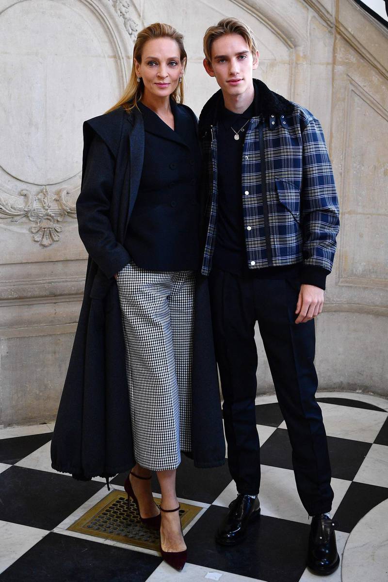 US actress Uma Thurman, left, poses with her son Levon Roan Thurman-Hawke ahead of the Dior Women's Spring-Summer 2020/2021 Haute Couture show. AFP