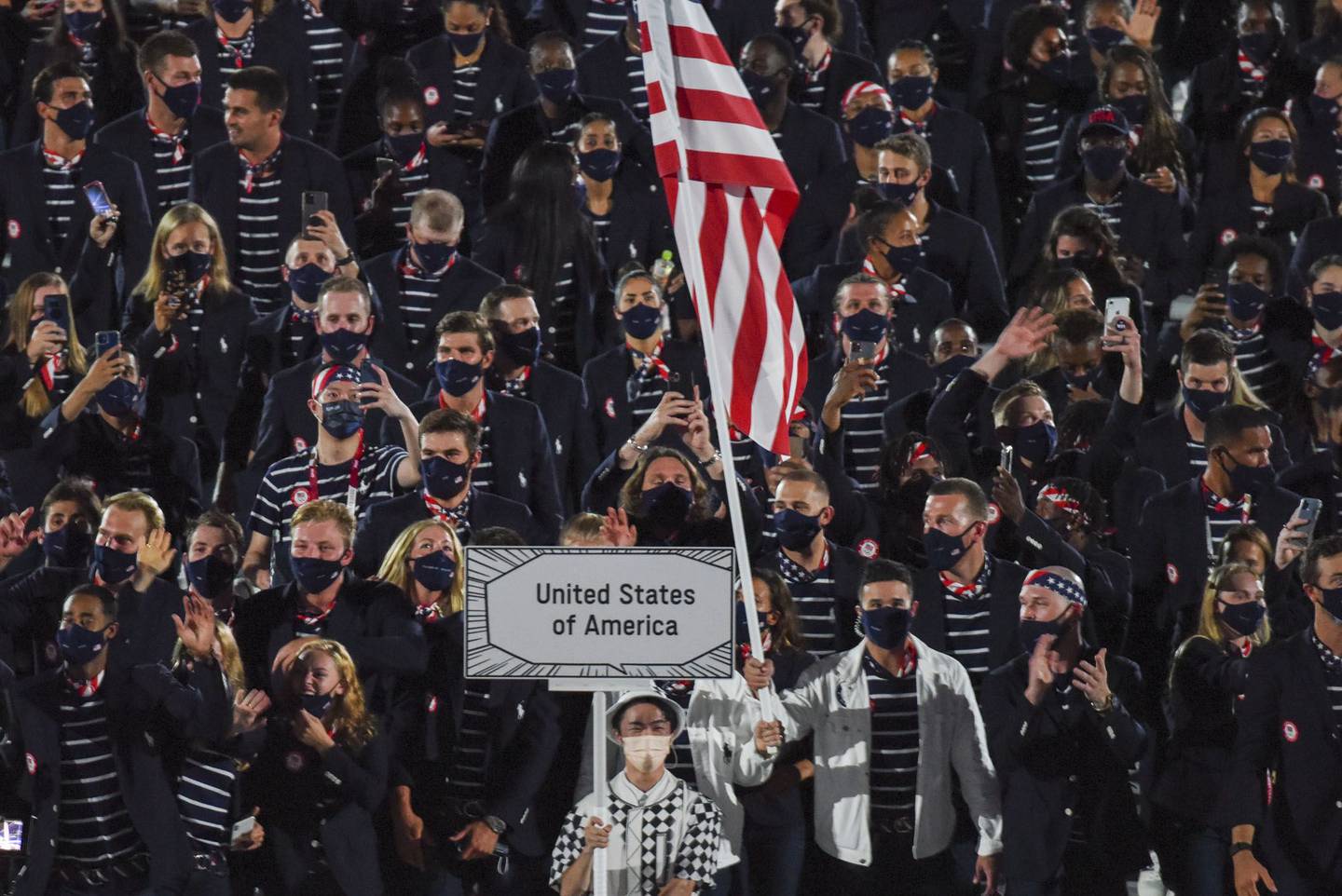 Members of Team USA wear Ralph Lauren during the opening ceremony of the Tokyo 2020 Olympic Games at the National Stadium in Tokyo, Japan, on Friday, July 23, 2021.  Bloomberg