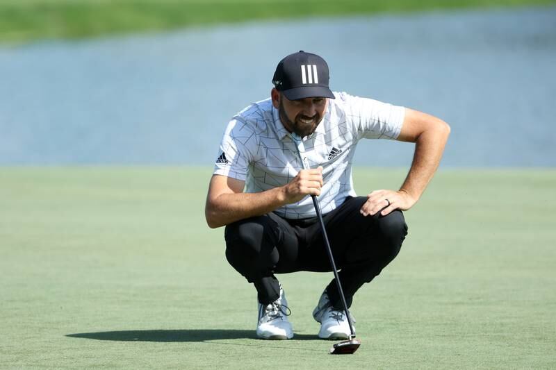Sergio Garcia of Spain lines up a putt on the 9th green during day one of the Slync.io Dubai Desert Classic at Emirates Golf Club on January 27, 2022. Getty 